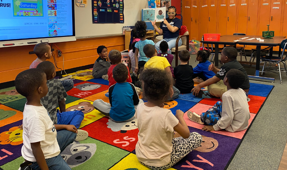 HUASB student reading books. 