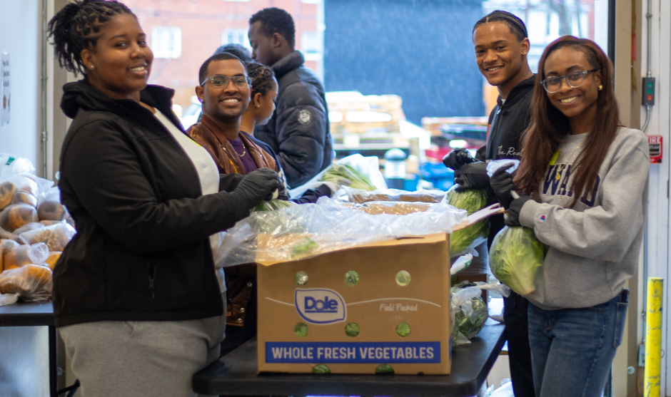 HUASB students preparing vegetables for the community. 