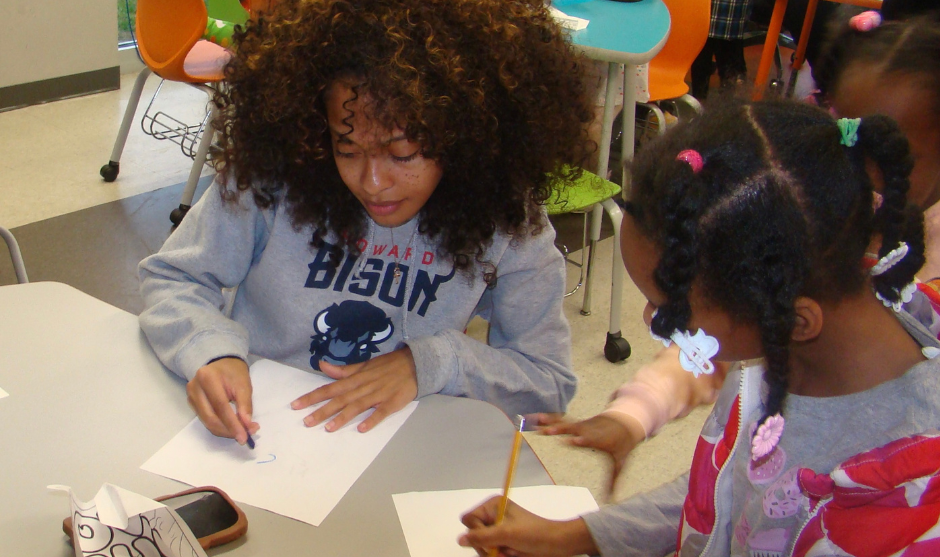 HUASB student tutoring a student